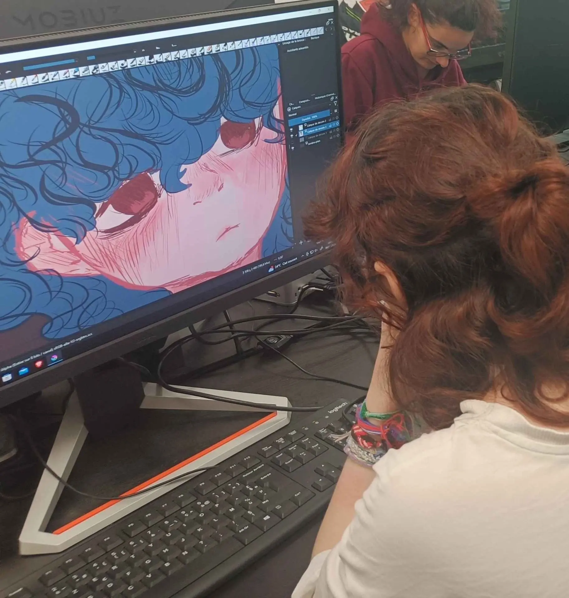 Elève de l'Académie Image Numérique qui dessine